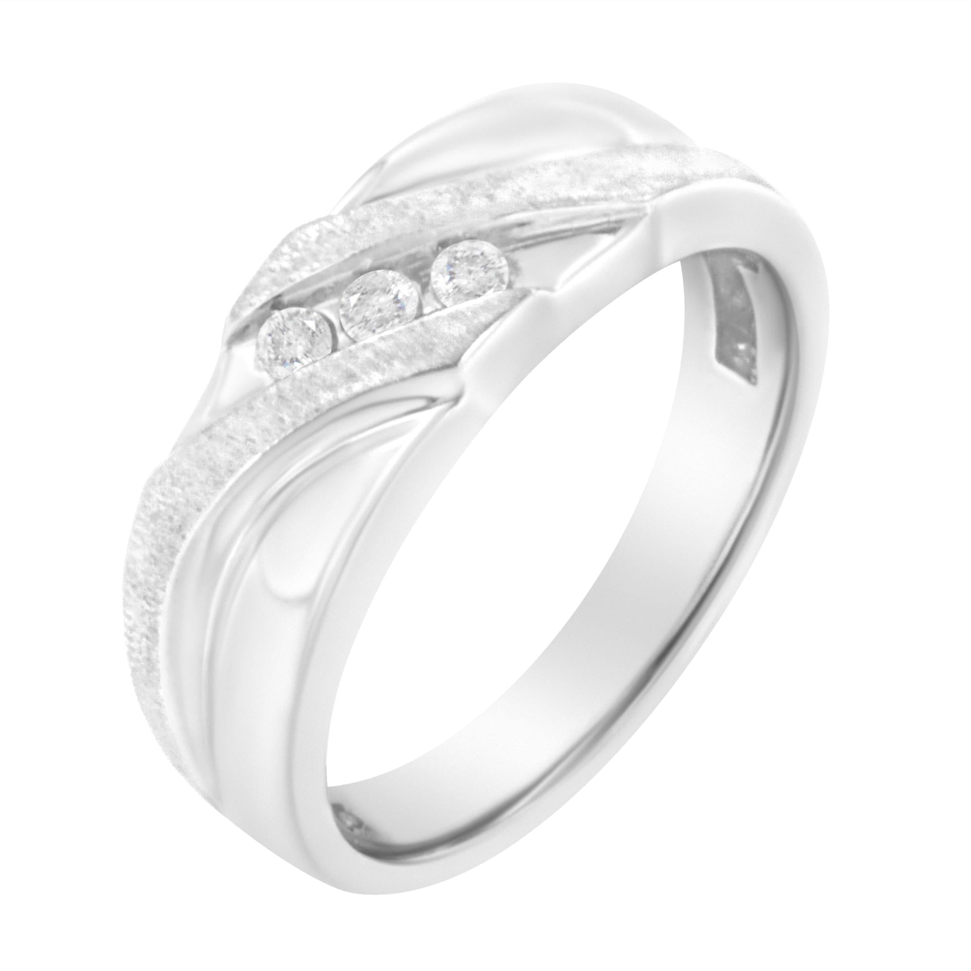 Silver ring with three small round diamonds and a split, textured band design.