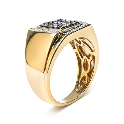 Gold ring with a square top, black and white stones, and intricate cutout side details.
