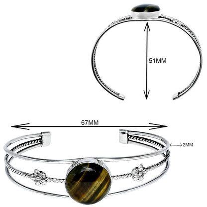 Silver bracelet with a central brown stone, floral accents, and measurements of 51mm by 67mm.