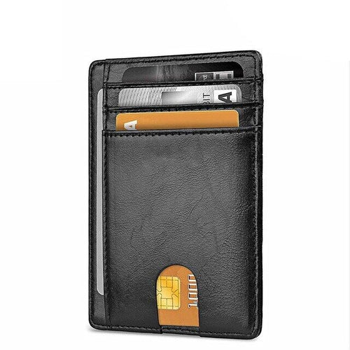 Black leather wallet with multiple card slots, holding credit cards and currency notes.