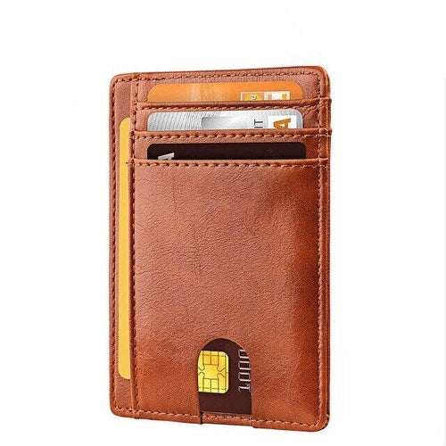 Brown leather cardholder with three cards partially visible in slim pockets.