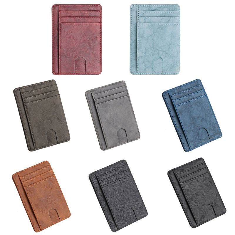 Seven leather cardholders in red, light blue, dark blue, brown, black, gray, and dark gray.