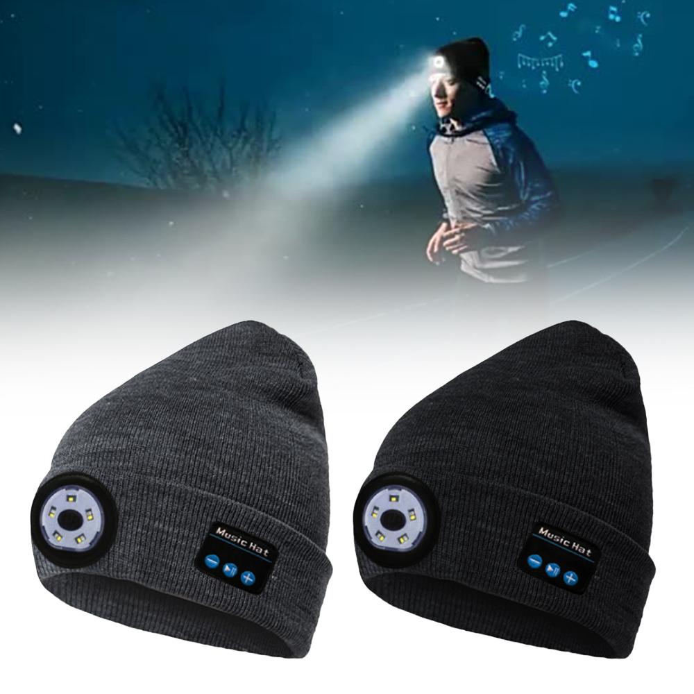 Gray beanies with built-in lights and control buttons, person jogging at night with headlamp.