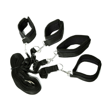 Black adjustable straps with hooks and loops, arranged on a white background.