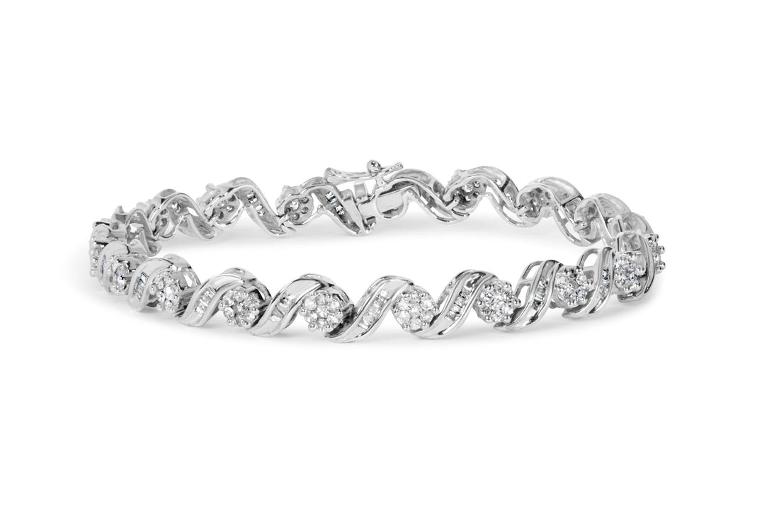 Silver bracelet with twisted links and embedded round crystals on a white background.