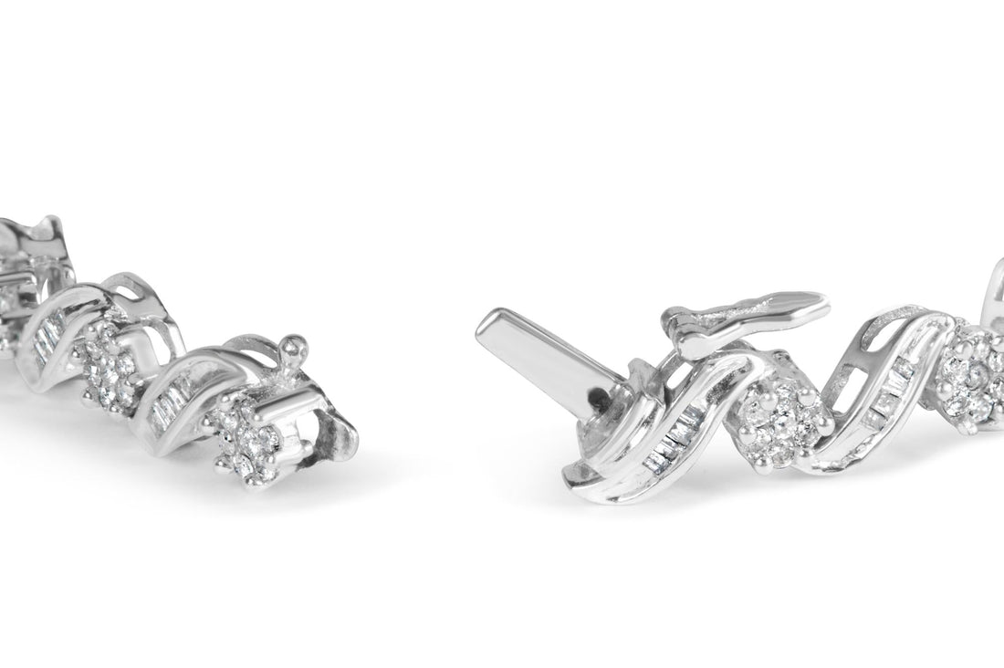 Silver bracelet with sparkling diamond clusters, featuring twisting links on a white background.