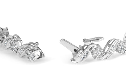 Silver bracelet with sparkling diamond clusters, featuring twisting links on a white background.