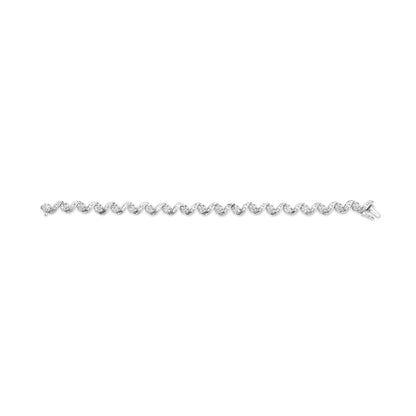 Silver bracelet with a wavy, intertwined design against a white background.