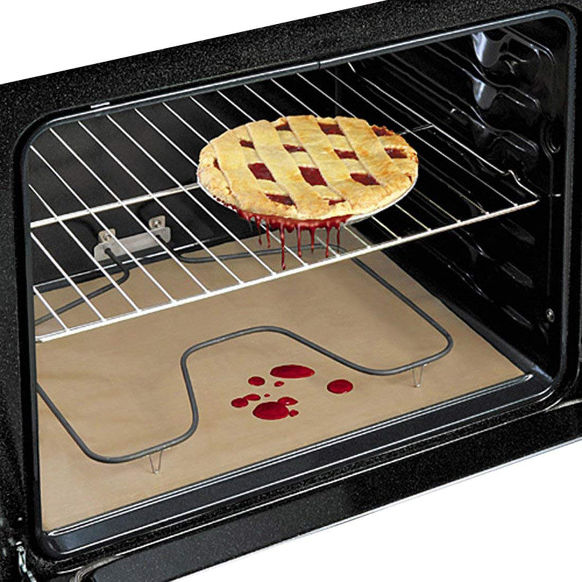 Pie in oven drips red filling onto liner below; lattice crust shown on middle rack.