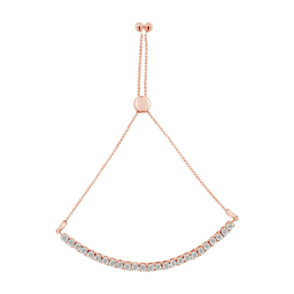 Rose gold bracelet with clear gemstones on an adjustable chain.