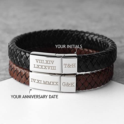 Two braided leather bracelets; one black, one brown, with engraved metal clasps.