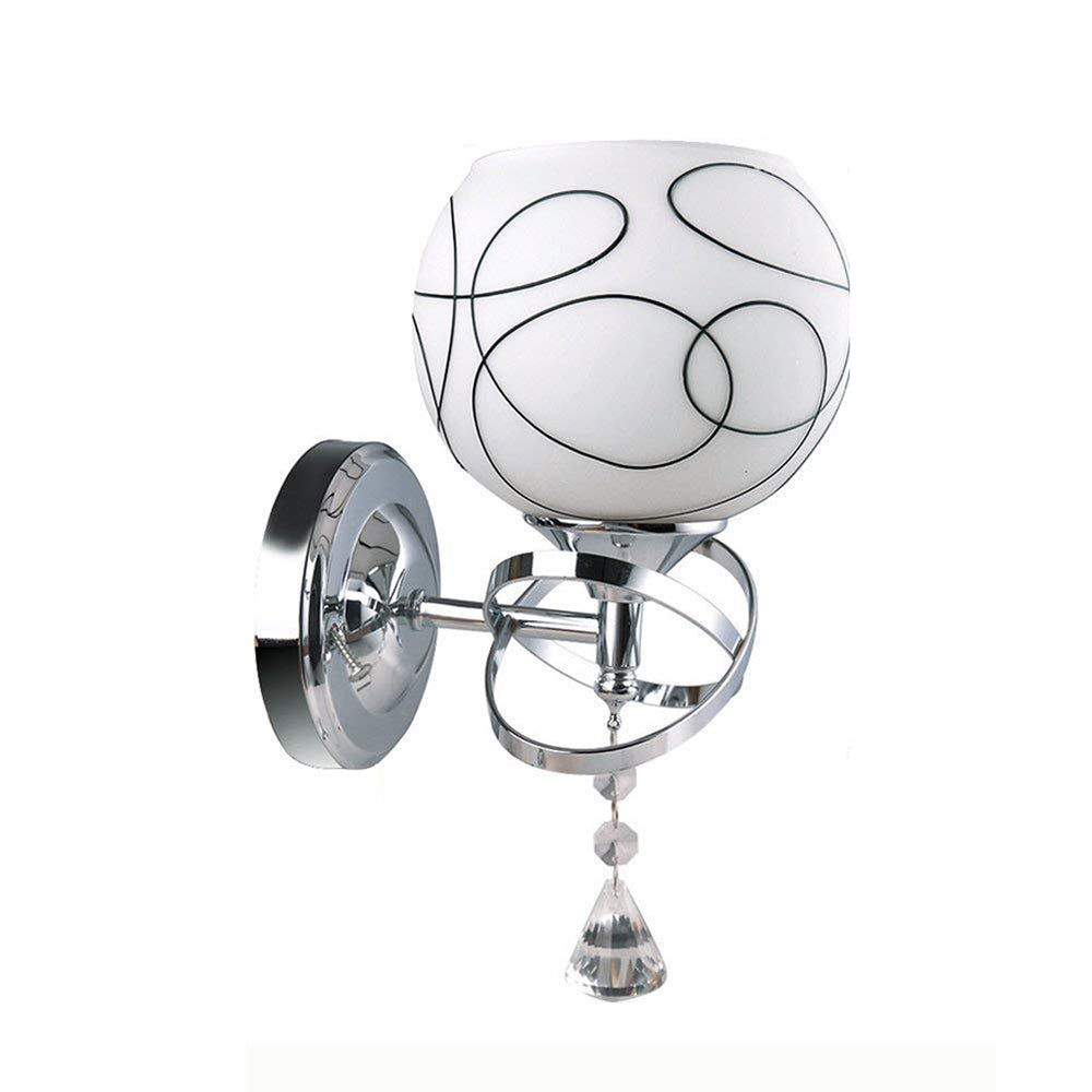 Wall sconce with white globe, black swirl pattern, chrome mount, and crystal hanging drop.
