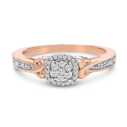 Rose gold ring with cushion diamond cluster, accent diamonds on band, and split shank design.