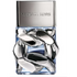 Silver-capped perfume bottle with metallic chain design, transparent base, and engraved logo.
