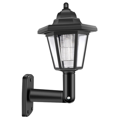 Black outdoor wall lantern with clear panels and hexagonal roof, mounted on a curved arm.