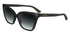 Black cat-eye sunglasses with gradient lenses and gold logo on the arms.