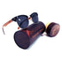 Sunglasses with dark lenses, black frame, and wooden arms on a wooden Engleberts case.