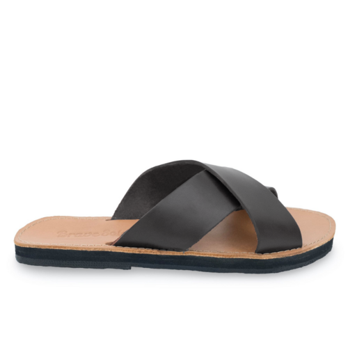 Black leather sandal with crisscross straps, tan insole, and black sole.