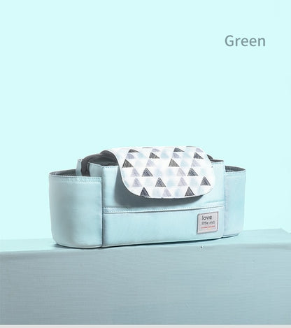 Light aqua bag with triangle-patterned flap, rectangular shape, and small front label.
