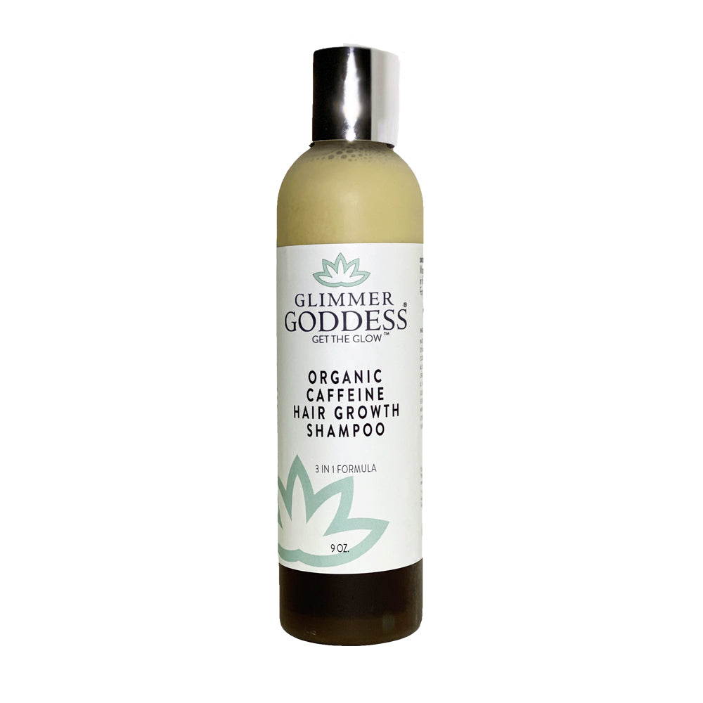Beige shampoo bottle with silver cap, labeled "Organic Caffeine Hair Growth Shampoo."