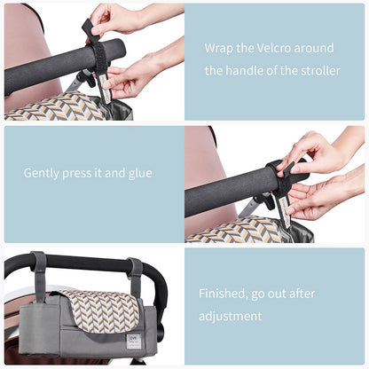 Hands attaching a geometric-patterned stroller organizer with Velcro to a black handle.