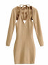 Beige long-sleeve dress with halter neck and open back. Fitted silhouette, minimalist style.