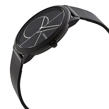 Black minimalist wristwatch with a mesh band, round face, and geometric lines on the dial.
