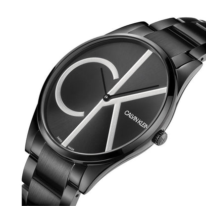 Sleek black watch with large silver letters "CK" on the dial and a stainless steel bracelet.