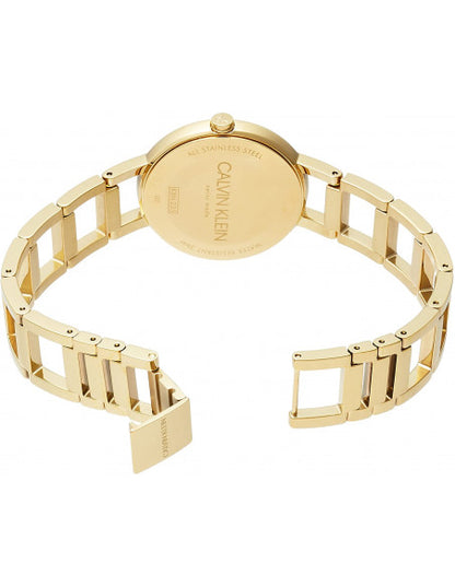 Gold-tone watch with open-link bracelet, round case back, and engraved logo.