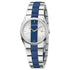 Silver and blue watch with a striped band and a silver dial displaying a date window at 3 o&