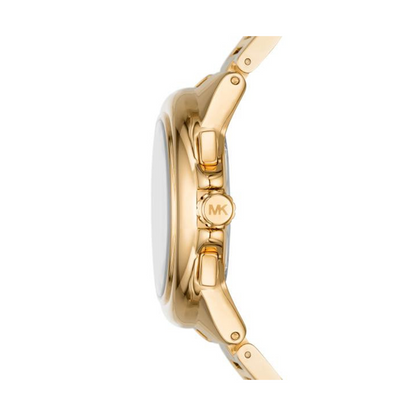 Side view of a gold watch with an MK logo on the crown and a sleek, metallic finish.