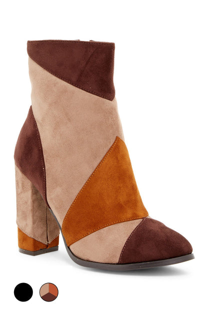 Color-blocked ankle boot with brown, tan, and orange suede sections, and a chunky heel.