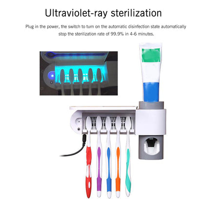 Toothbrush holder with UV light sterilizer, holding five colorful toothbrushes and toothpaste.