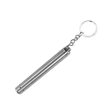 Silver metallic cylindrical flashlight with a keychain ring attached, on a white background.