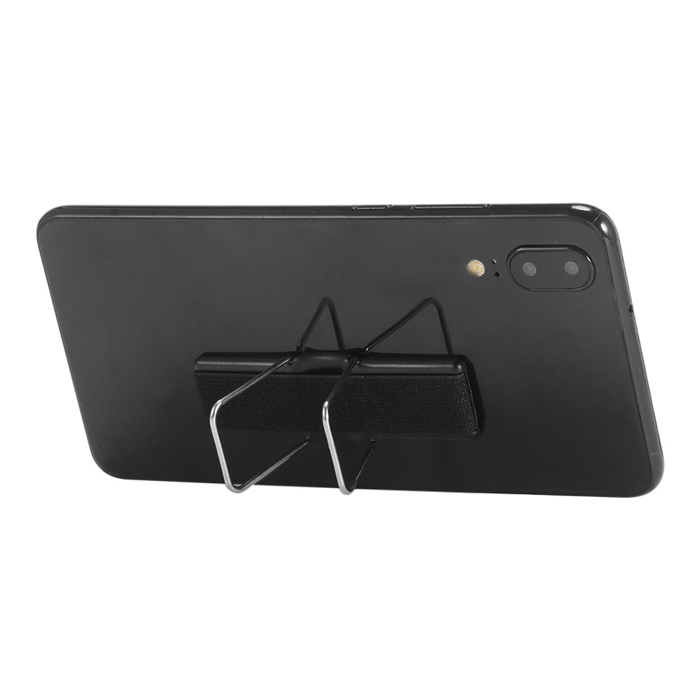 Black smartphone with dual cameras, on metal stand, viewed from the back.