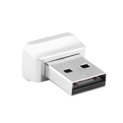 Silver USB adapter with a rectangular metallic plug and a smooth, white plastic casing.