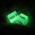 Two glowing green dice with words like "TOUCH," "EARS," and "LIPS" in black text.
