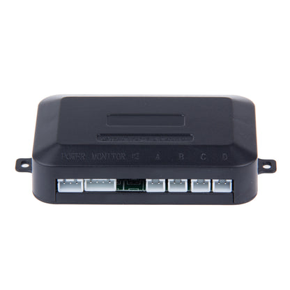 Black rectangular electronic device with multiple white ports labeled Power, Monitor, A, B, C, D.