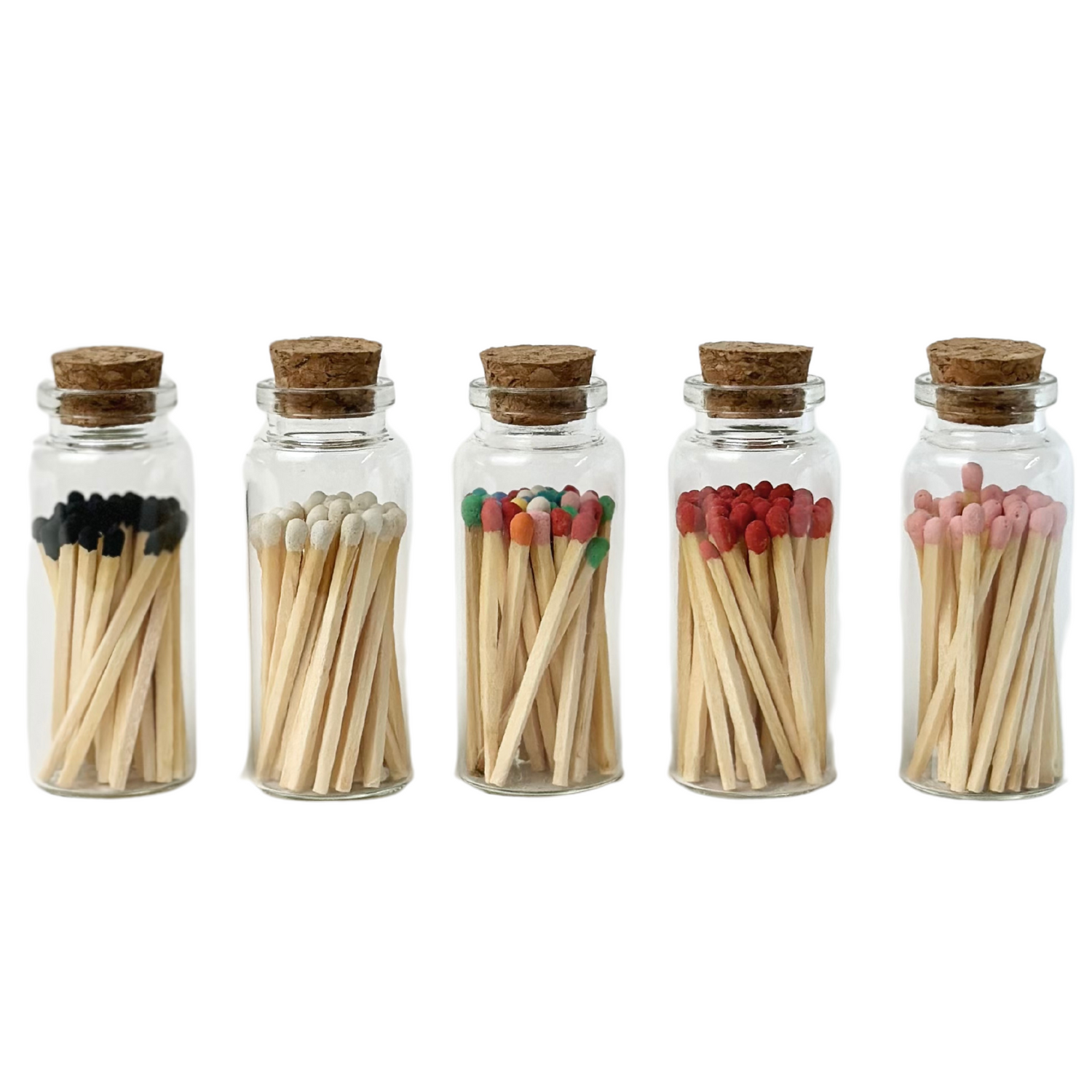 Five corked glass jars with matches: black, white, multicolored, red, pink tips.