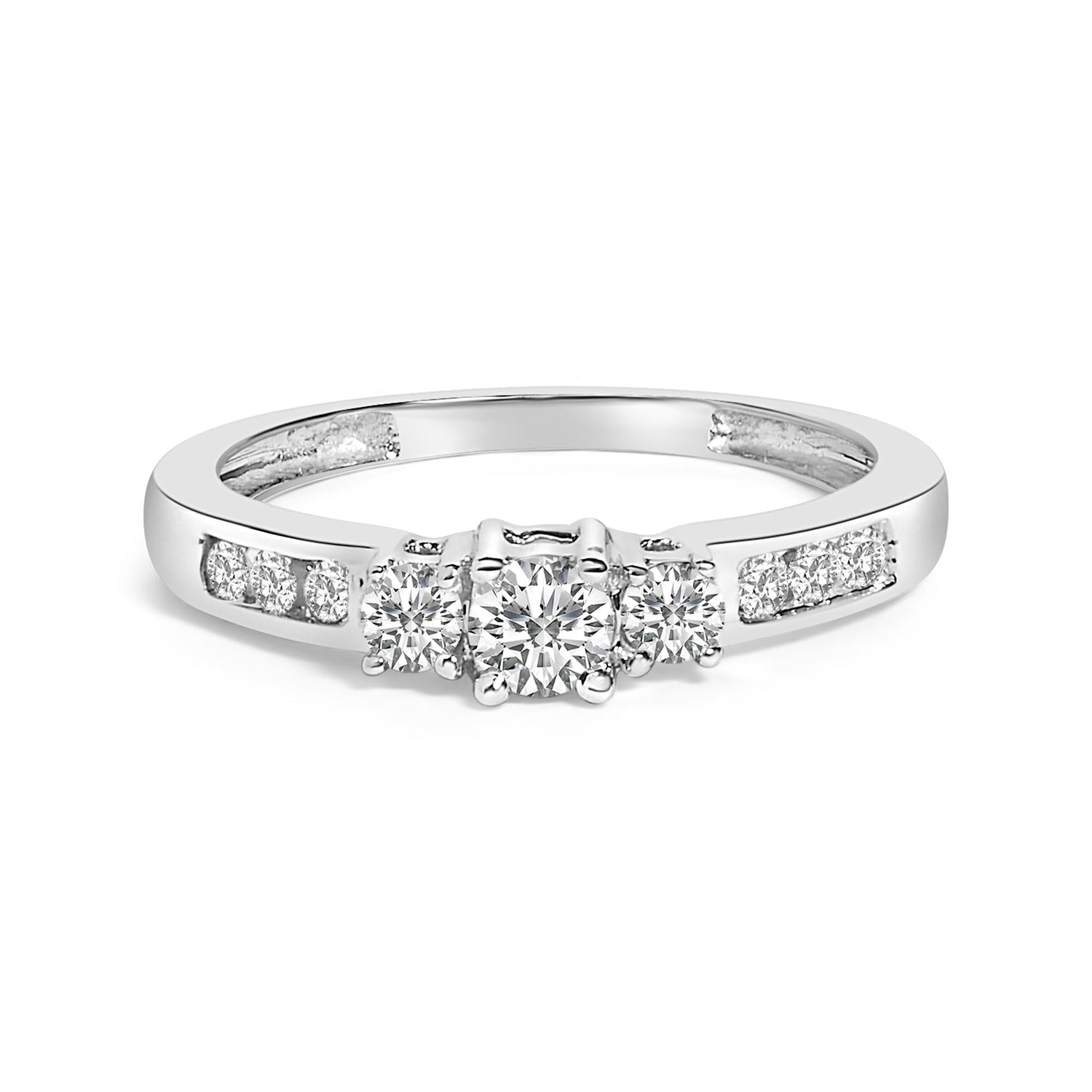 Silver ring with three round center diamonds and additional smaller diamonds set in the band.