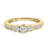 Gold ring with three larger diamonds in the center and smaller diamonds on the band.