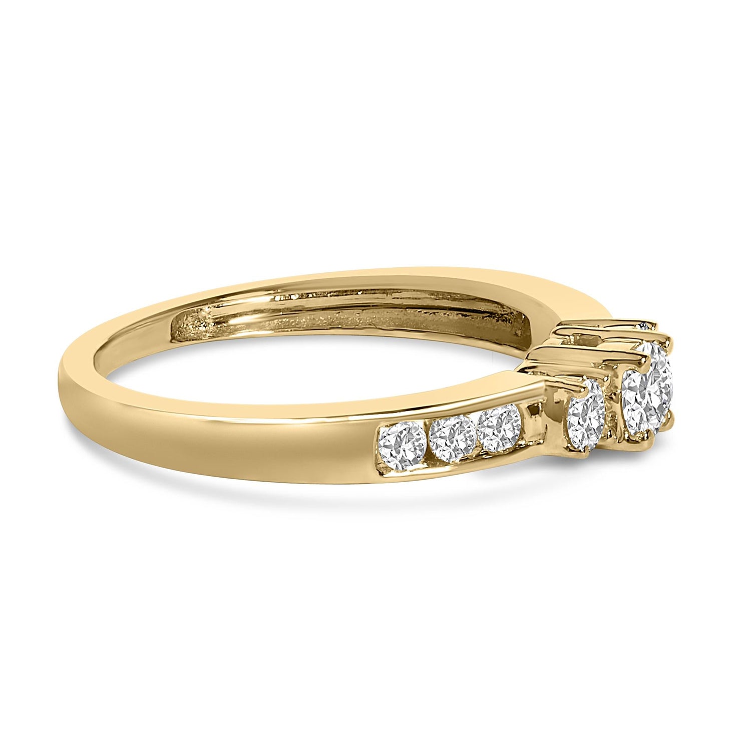 Gold ring with a row of small diamonds on the band and three larger diamonds on top.