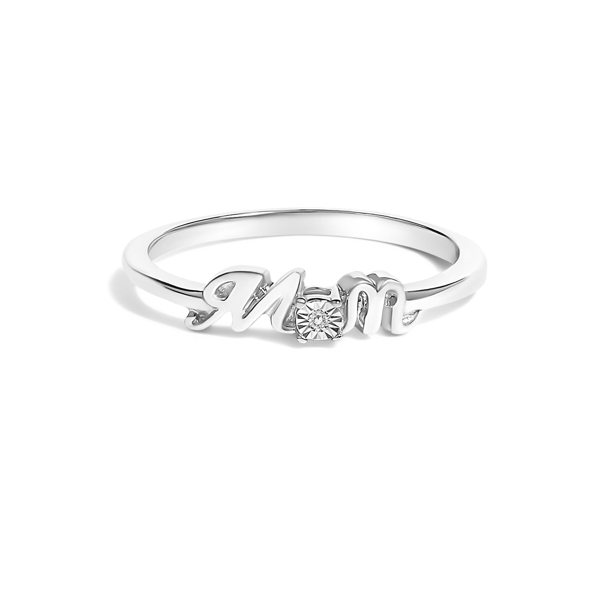 Silver ring with the word "Mom" and a small diamond set in the center.