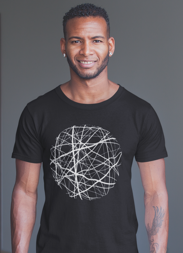 Man wearing a black T-shirt with white abstract circular design; has earrings and a tattoo.