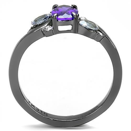 Silver ring with a round purple gem center, flanked by two smaller clear gems on the band.