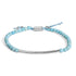 Silver bar bracelet with faceted light blue beads and adjustable cord.