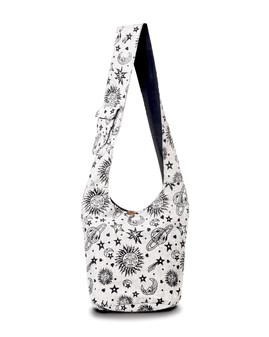 White hobo bag with black celestial designs of suns, moons, and stars.