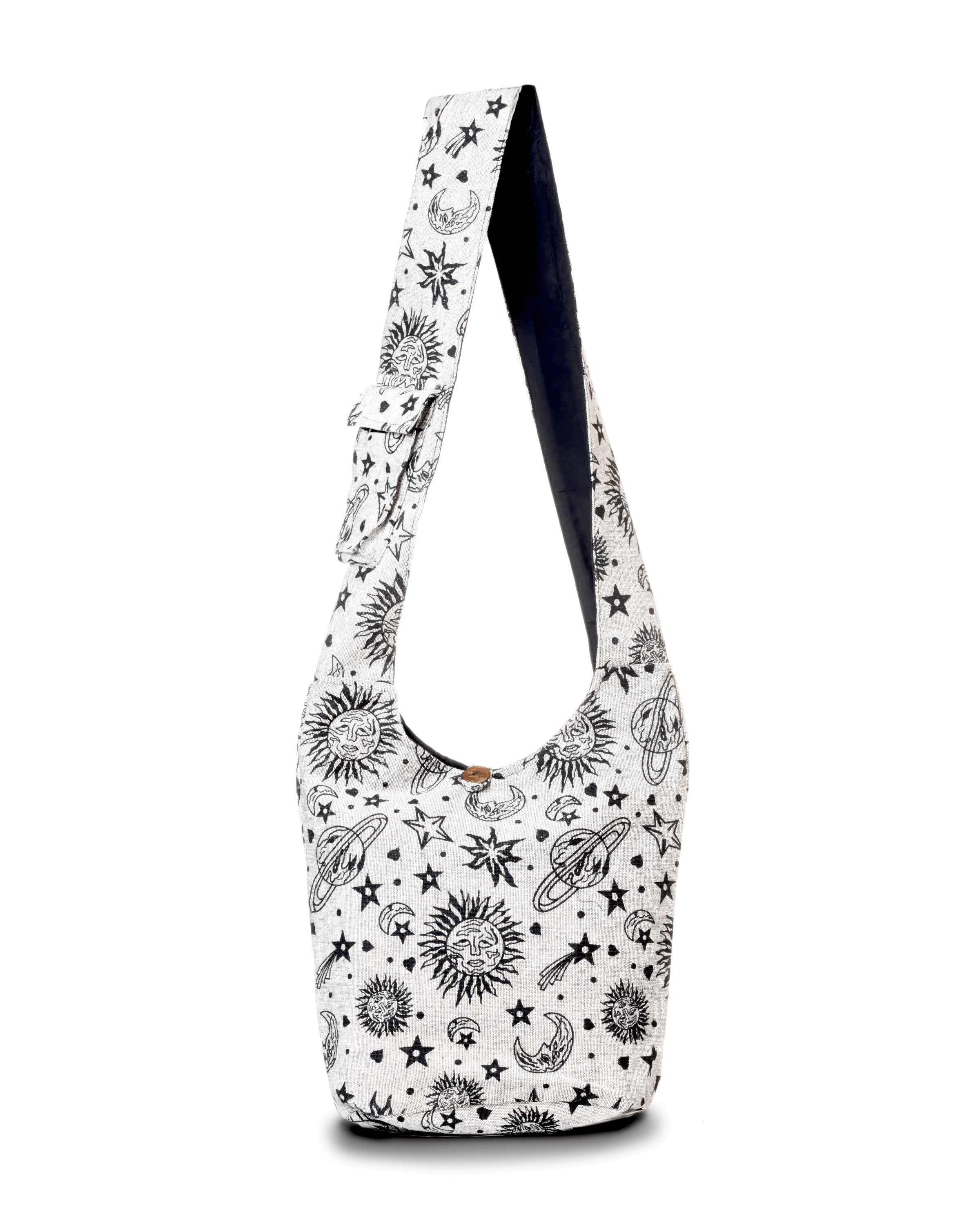 White hobo bag with black celestial designs of suns, moons, and stars.