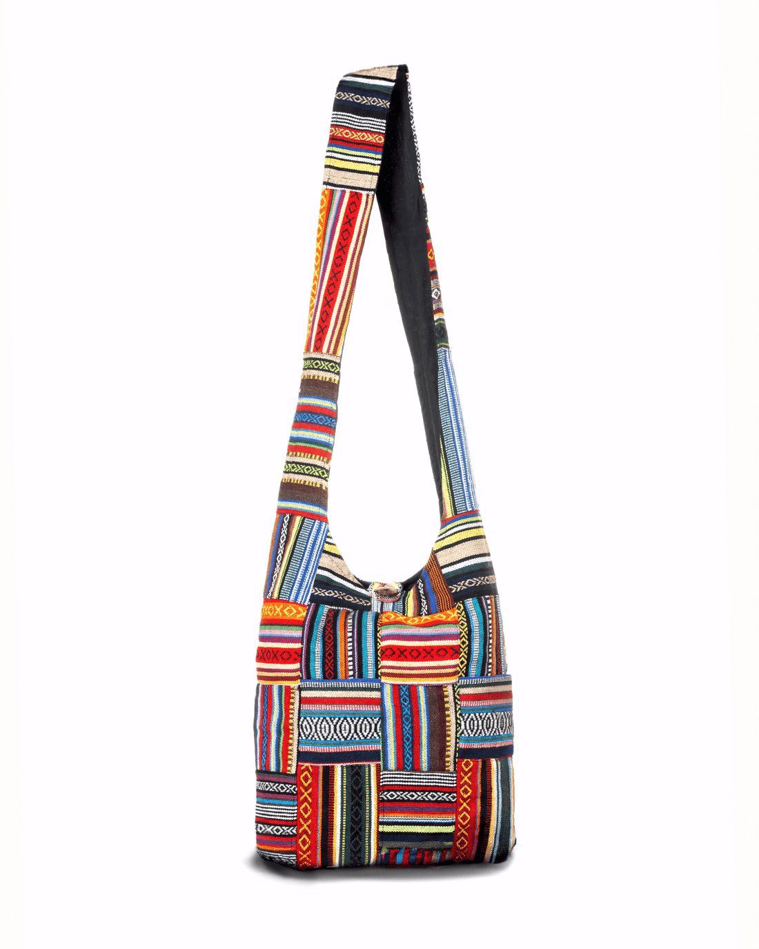 Colorful patchwork shoulder bag with intricate geometric patterns and a long strap.