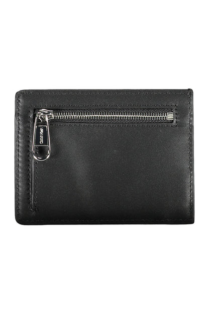 Black wallet with a smooth texture and a silver zipper on the front.